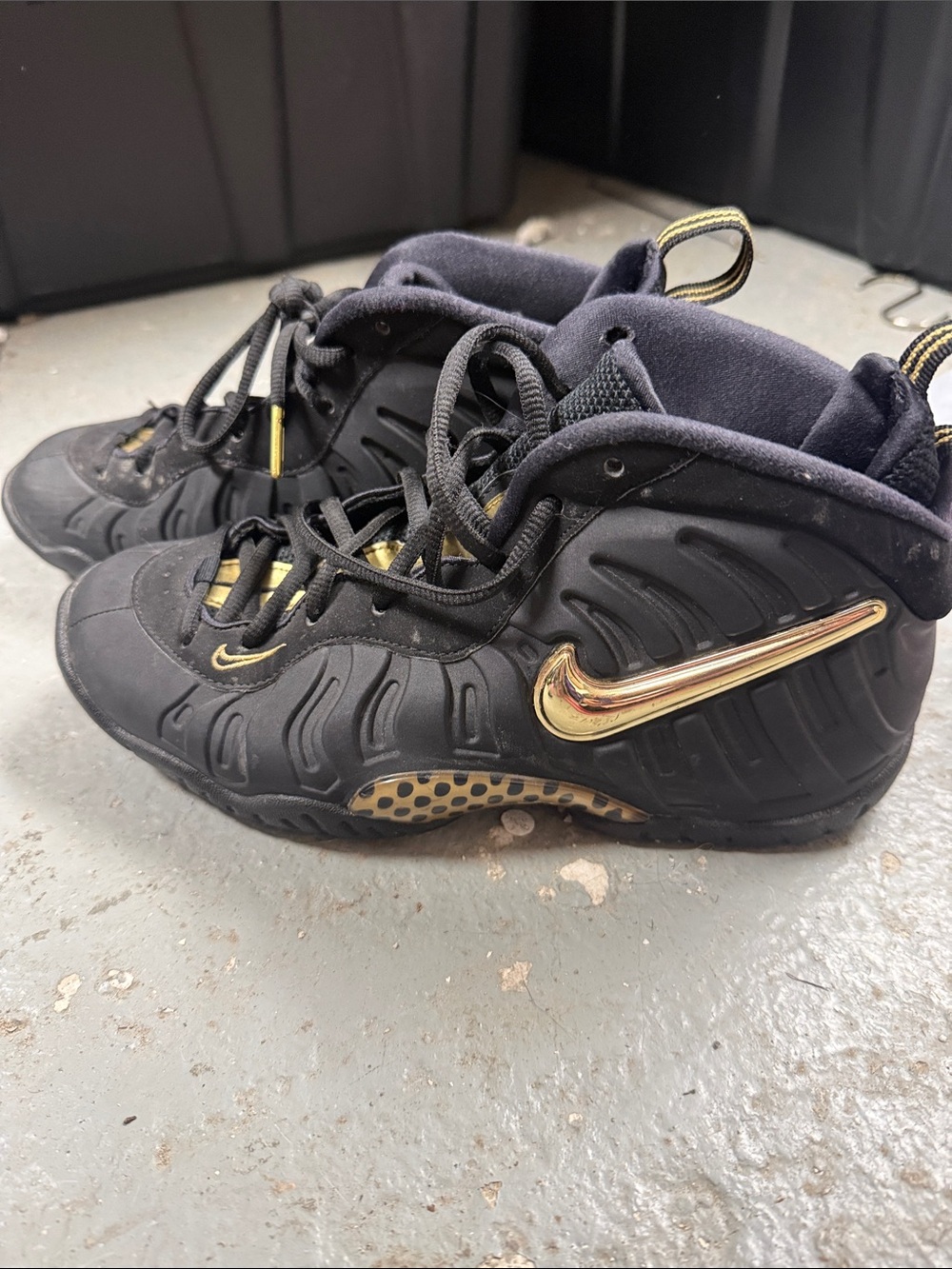Nike Kids Black Sneakers with Gold Swoosh